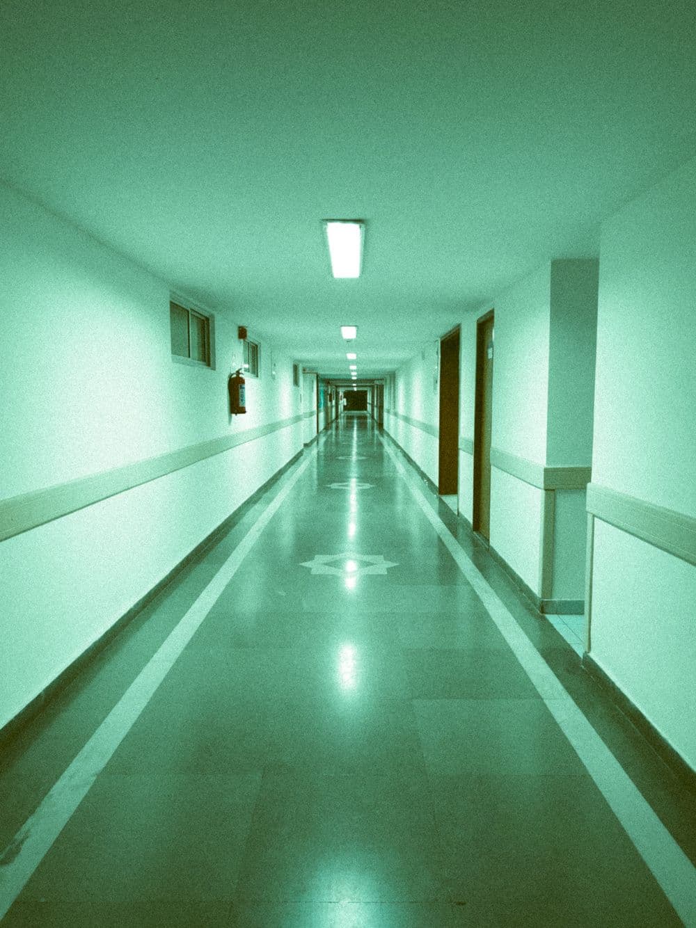 A clean, empty hospital corridor.